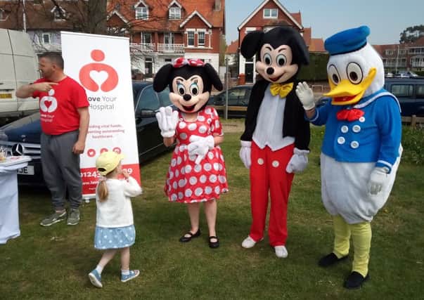 Donald Duck, Minnie Mouse and Mickey Mouse were handing out competition forms for the Easter egg hunt at Broadwater Easter Fayre