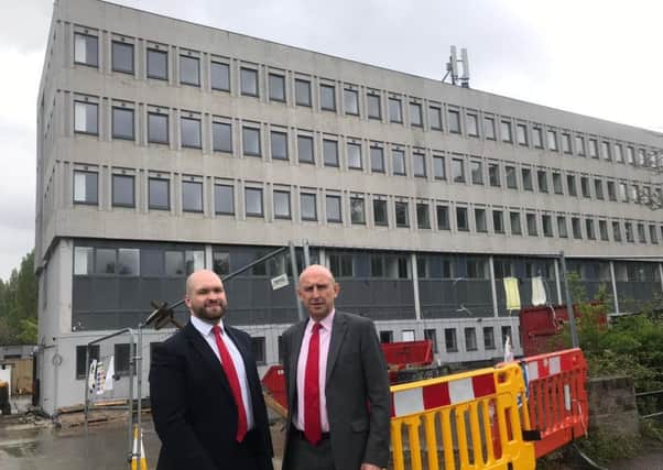 Peter Lamb, Labour leader of Crawley Borough Council and John Healey, Labour's shadow housing secretary, outside a permitted development with more  than 200 flats in Russell Way, Crawley