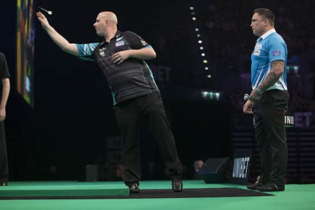 Rob Cross at the oche during his 7-7 draw against Gerwyn Price. Picture courtesy Lawrence Lustig/PDC
