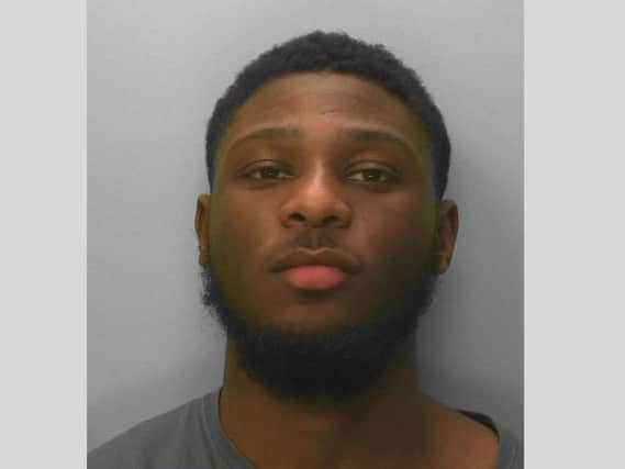 Kamara tried to barricade himself in the flat to stop officers getting in. Picture: Sussex Police