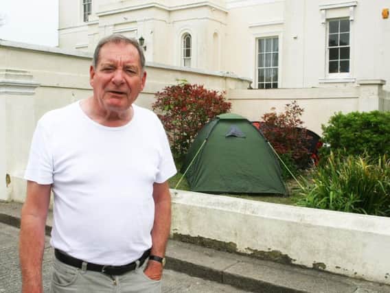 Robin Biggs is not happy about the tents outside Beach House. Picture: Derek Martin