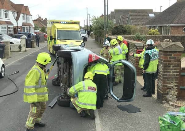 Firefighters rescued two people who became trapped in the collision