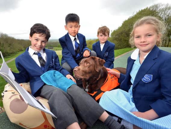 Pupils at Skippers Hill Manor Preparatory, in Mayfield, with labrador Lottie.  Photograph: Peter Cripps/ 24-4-19 (06)