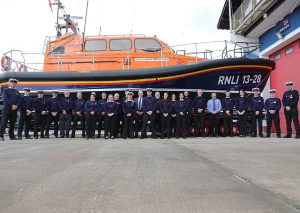 The crew of the newly named Hastings Lifeboat 'Richard and Caroline Colton'. Photo by RNLI/Kt Bruce SUS-190429-104300001