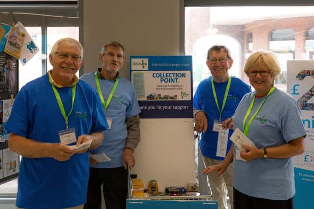 Volunteers from Shoreham Foodbank at the collection point in The Co-op in Ham Road, Shoreham