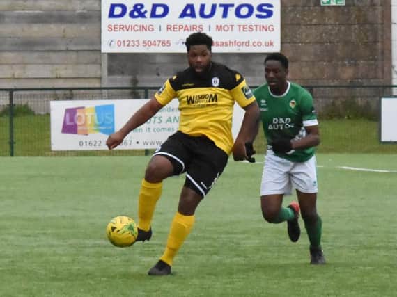 Omar Folkes (left) in action for Haywards Heath Town against Ashford Town on Saturday. Picture by Grahame Lehkyj