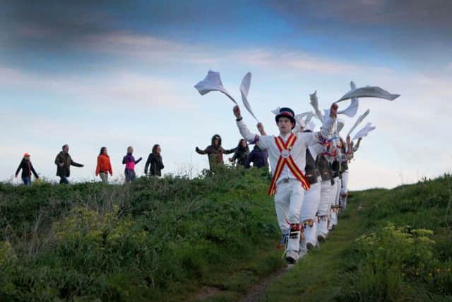 Dancing at Dawn, West Hill, Hastings. Photo by Kevin Boorman.Three local sides, Mad Jacks Men, Mad Jacks Women, and Hannahs Cat, followed the tradition of dancing at dawn on May Day, on Ladies Parlour, against the historic backdrop of Hastings Castle. Starting at 0500, each side performed a number of dances, with the event finishing with a mass dance around the perimeter of Ladies Parlour. SUS-180105-085138001