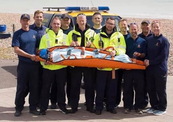 The Shoreham Coastguard volunteers with the stretcher