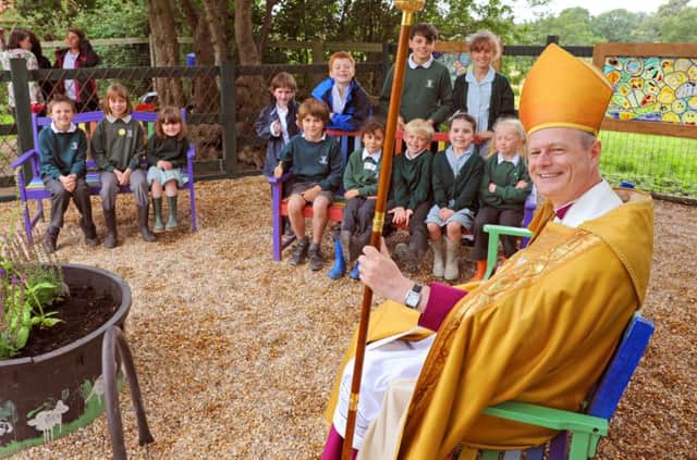 The Rt Rev Mark Soweby pictured opening a new Peace Garden at Shipley CofE School in 2012