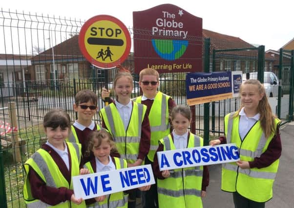 Pupils at the Globe Primary School call for a new pedestrian crossing