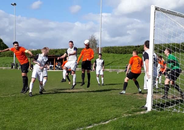 Bexhill United are forced to defend during their 2-1 defeat away to Mile Oak. Picture courtesy Karen Hilton