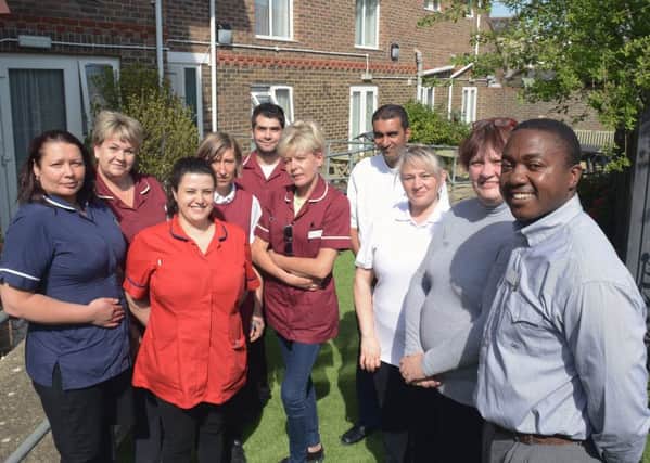 ks190238-1 Cherington House phot kate
Managers Lorraine Davis and Abel Mberi, right, and staff at Cherington House nursing home delighted with their CQC rating.ks190238-1 SUS-190430-191119008