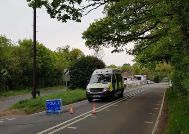 The A264 has been closed. Photo by Horsham Police