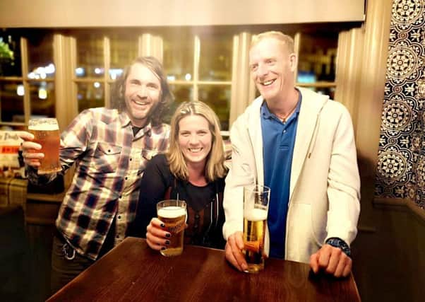 (From left): Pub quizzers Mark Skinner, Mary McDowell and Mark Thompson