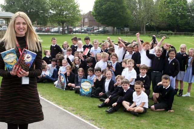 Author Vashti Hardy with her two novels at Glebe Primary School in Southwick. Photo by Derek Martin DM1950015a