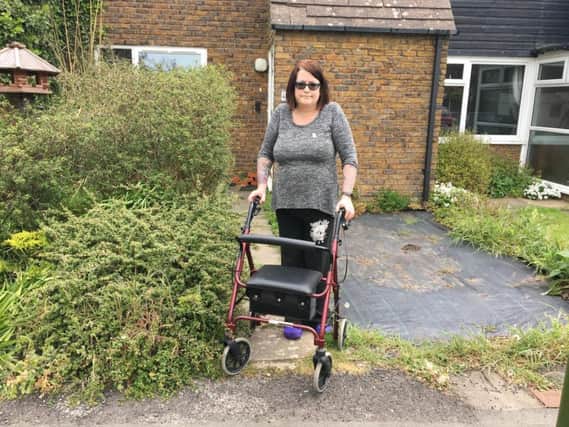 Tracey Hoff outside her home in Winterbourne Road