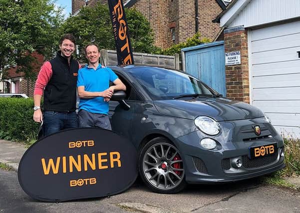 Christian Williams and Paul Thorpe with the dream car