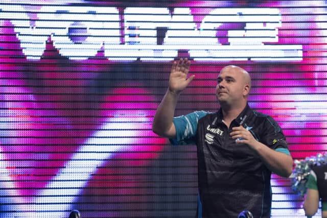 Rob Cross acknowledges the crowd in Manchester. Picture courtesy Lawrence Lustig/PDC