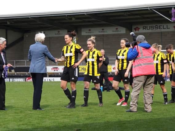 Crawley Wasps being presented with their National League Cup final medals after losing 3-0 to Blackburn Rovers at Burton Albions Pirelli Stadium. 
Picture by Alan Sillwood-Brown