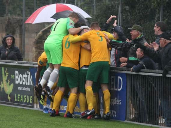 Horsham players - including goalkeeper Josh Pelling celebrate. Picture by John Lines