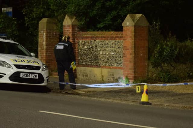 A Forensic scientist at the scene in Upper Avenue Road, Eastbourne last night. Photo by Dan Jessup