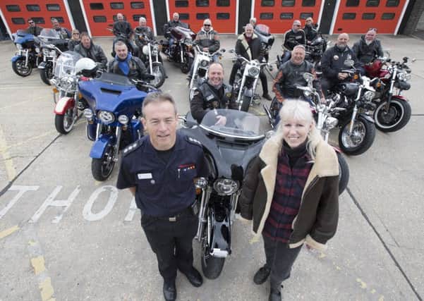 Worthing Fire Station manager Roy Barraclough with ride organiser Clive Johnson, his wife Karen and other members of the 1066 Chapter, a Harley Davidson bike group