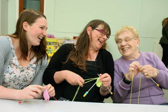 Knitters Elizabeth Bennett, Josephine Tildsley and Jackie Squires. Photo by Derek Martin DM1951050a