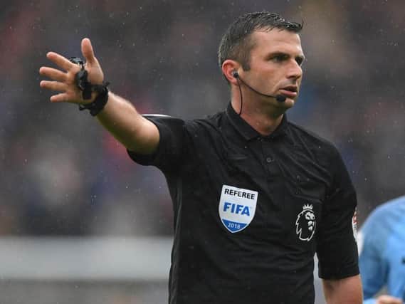 Michael Oliver will be in charge of Brighton v Manchester City. Picture by Getty Images