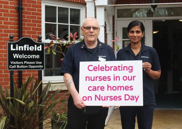 Martin Gallagher with fellow nurse Vigi at Linfield House in Worthing