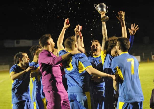 Northiam 75 II celebrate after winning the Robertsbridge Charity Junior Cup at The Pilot Field last night. Picture by Simon Newstead