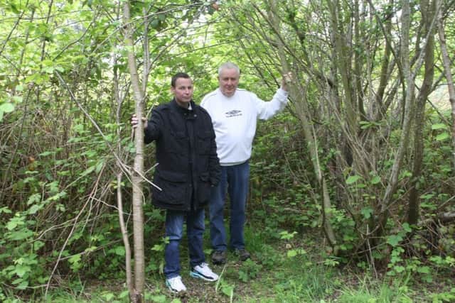 Southwick Allotment holder Kevin Hartney, right, wants to take over disused land. Pictured with Mark Woodley. Photo by Derek Martin Photography.