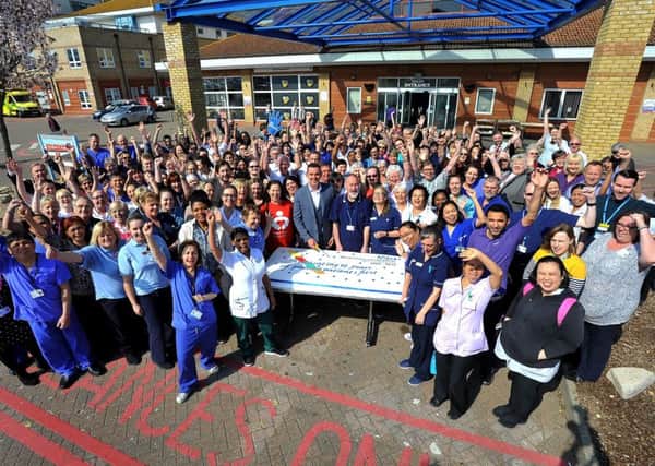 Staff at Western Sussex Hospitals NHS Trust celebrate its 10-year anniversary