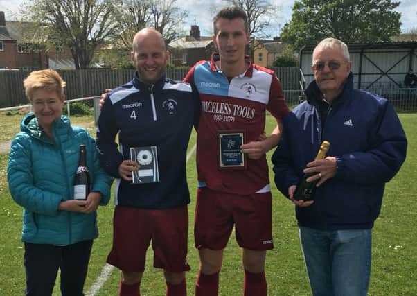 Little Common Football Club's joint players of the season Russell Eldridge and Liam Ward receive their awards from Gill Richardson and Sam Stevens