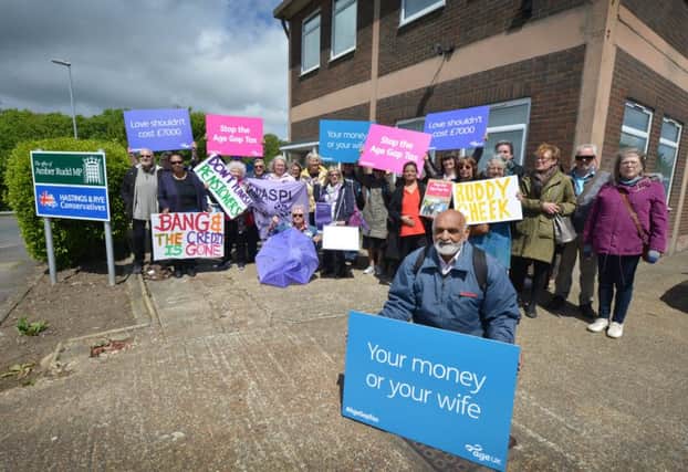 Pensioners protesting outside Amber Rudd's office in St Leonards. (The Age Gap Tax campaign). SUS-190905-133000001