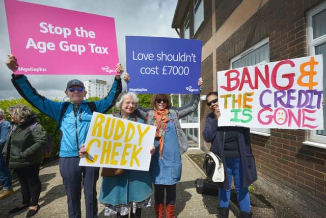 Pensioners protesting outside Amber Rudd's office in St Leonards. (The Age Gap Tax campaign). SUS-190905-133122001