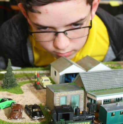 Max Goodwin, 15, with his layout. Photo by Derek Martin DM1951844a