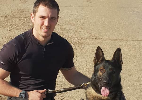 Police dog Lewis with PC Andy Dunkling