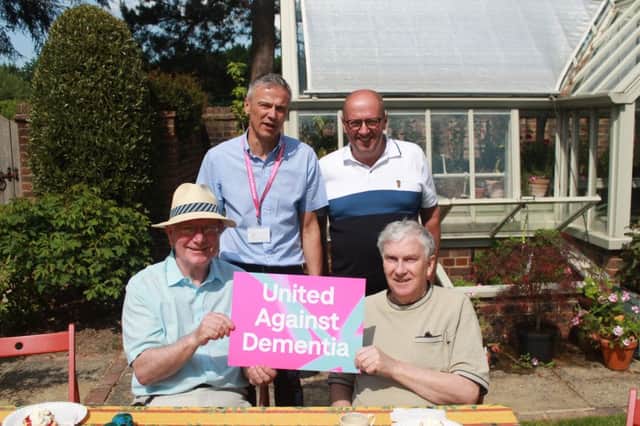 Tim Wilkins, Alzheimers Society service user, and members of the Horsham Rusty Brains at Warnham Park in 2018.