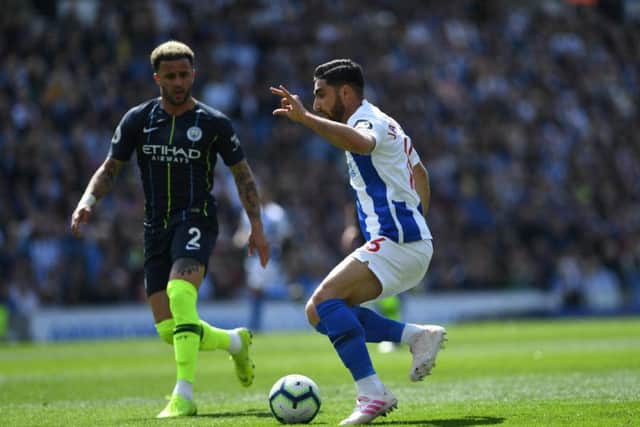 Brighton's Alireza Jahanbakhsh and Man City's Kyle Walker. Picture by PW Sporting Photography.