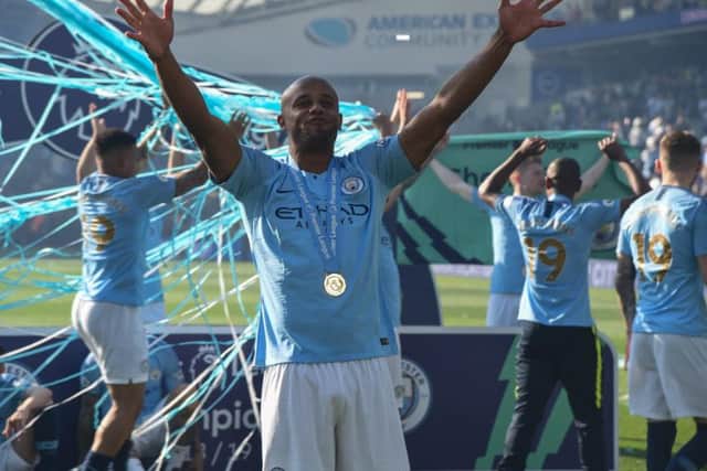 Vincent Kompany leads the celebrations. Picture by PW Sporting Photography