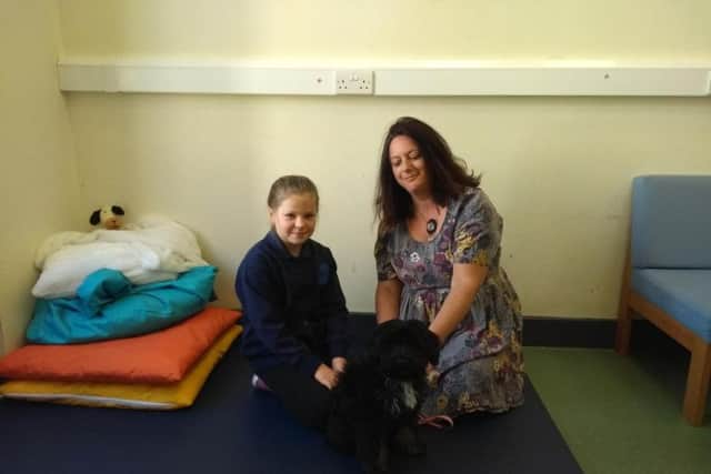 Maisey Beaver-Middleton with deputy head Teresa O'Connell and Frida