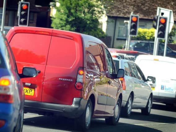 An accident on the A24 is causing delays