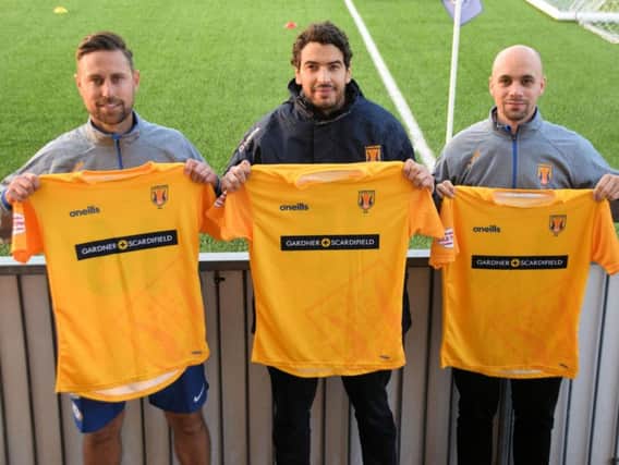 Lancing manager Naim Roune (centre) head coach/assistant manager, David Altendorff (left) and assistant manager/player, Kane Louis