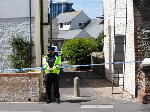 Police have cordoned off an alleyway next to Pier Road, Littlehampton