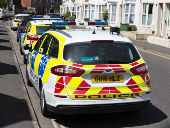 Several police cars were sent to the incident in New Road, Littlehampton