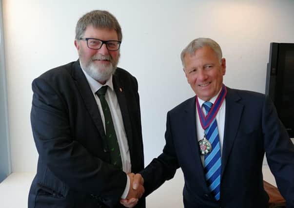 Outgoing chairman of East Sussex County Council Peter Pragnell with his successor David Elkin