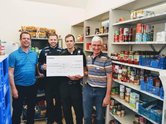 Police donate cash to Brighton Food Bank