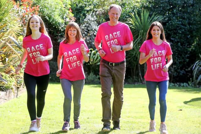 Actress and comedian Zoe Hilson with husband Steve and daughters Tassia and Blaise. Picture: Cancer Research UK