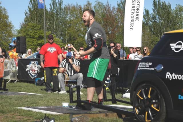 Andrew after completing the deadlift event with a 350kg car. Pic: Tom Craig SUS-190517-144437001