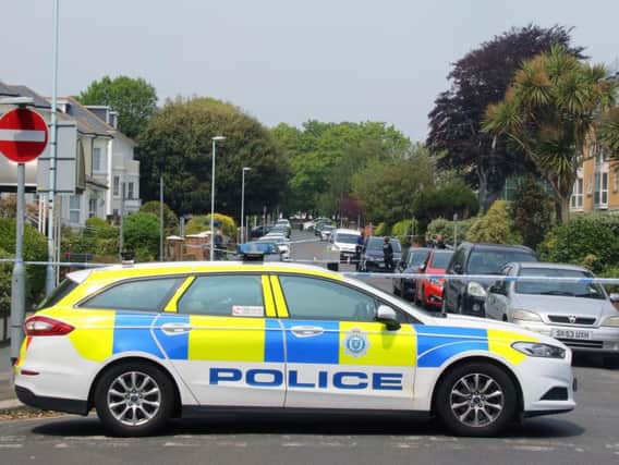 Officers on the scene in Gratwicke Road